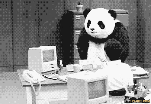 A guy in a panda suit breaks a computer on someone's desk